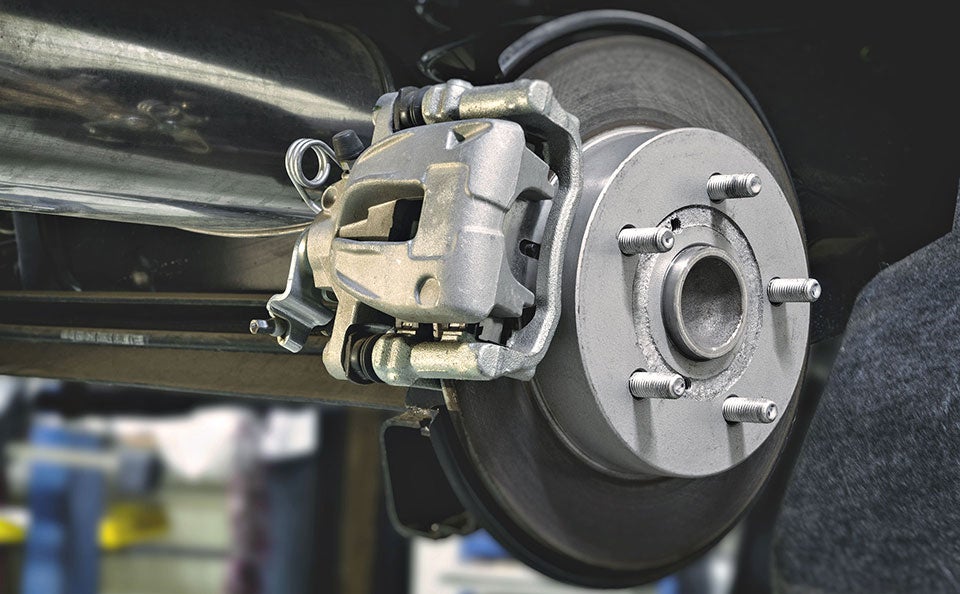 Close-up view of brakes being repaired